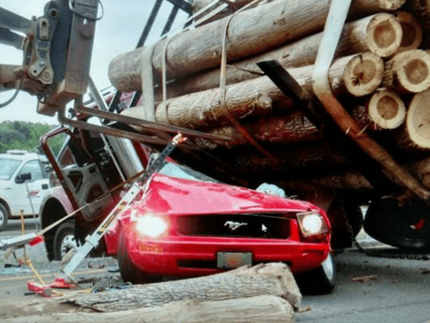 Rutledge Woman Survives 18-Wheeler Log Spill That Crushed Her Car